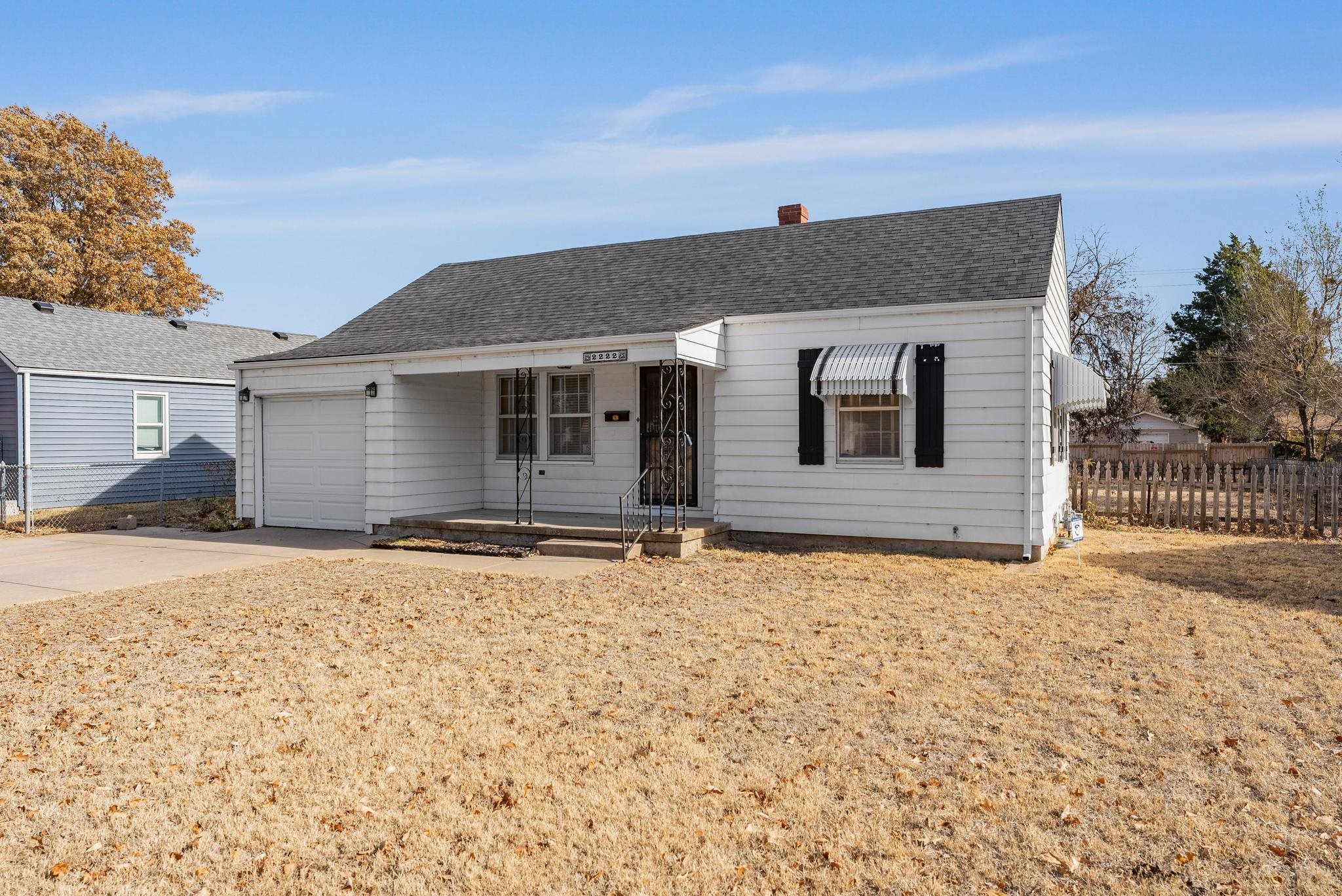 2222 South Topeka Street Wichita, KS 67211 - Photo 3 of 36 New Roof, gutters, awnings, & shutters in 2021!
