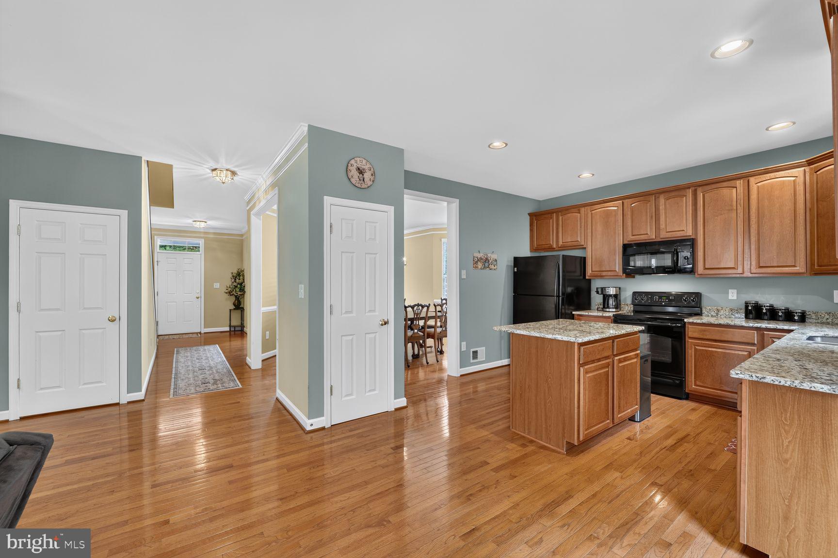 9957 Guilford Road Jessup, MD 20794 - Photo 11 of 37 Kitchen leads to Foyer and Dining Room