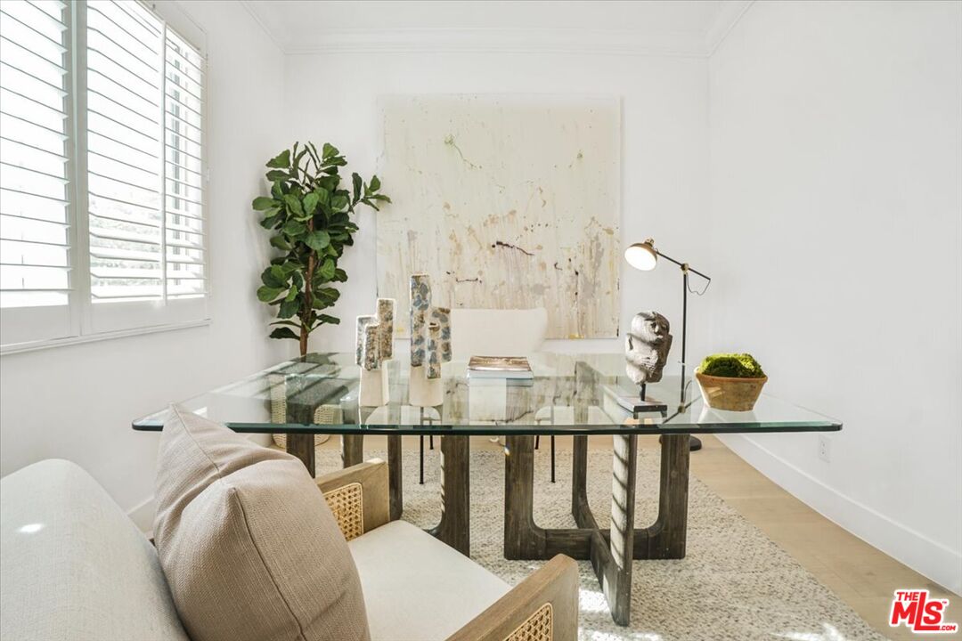 5717 Topeka Drive Tarzana, CA 91356 - Photo 22 of 52 a living room with furniture and window