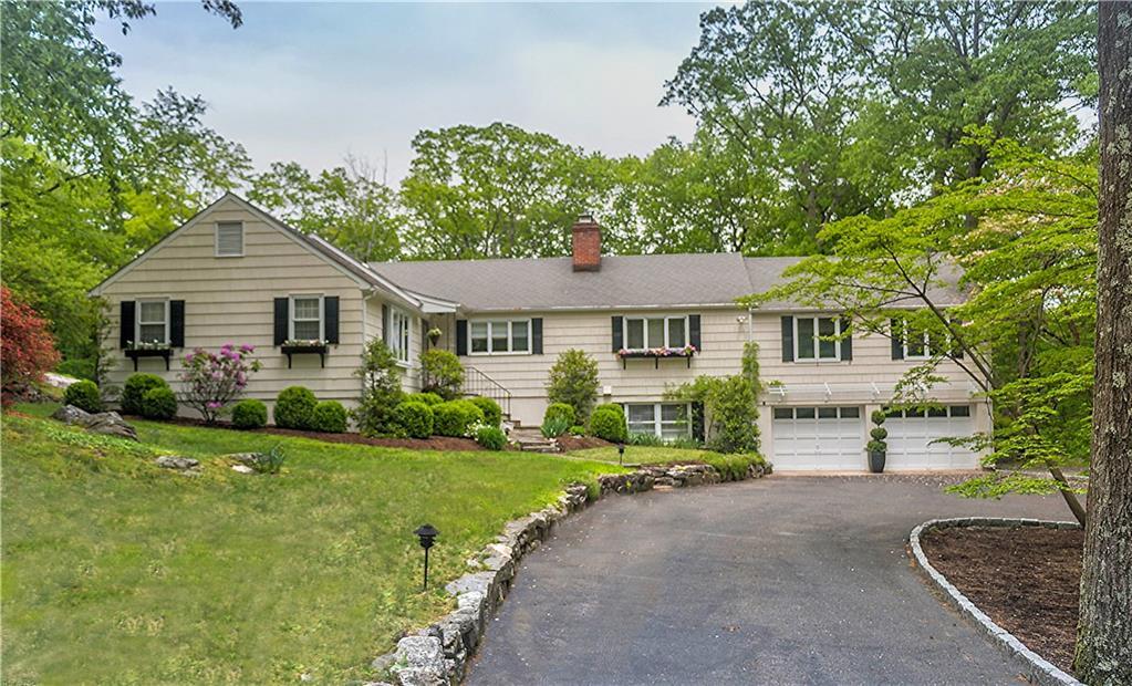 33 Powder Horn Hill Road Wilton, CT 06897 - Photo 1 of 1 Lovely rambling ranch home sited high on a private lot in South Wilton