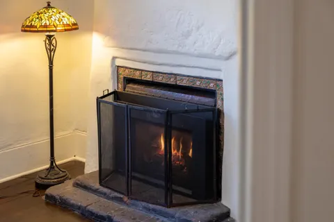a living room with a fireplace