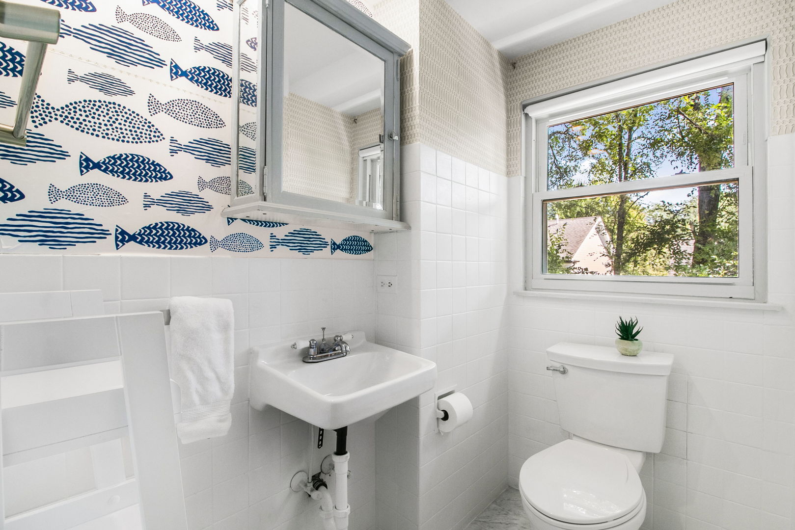 381 Wilson Street Winnetka, IL 60093 - Photo 16 of 28 a bathroom with a sink toilet and shower