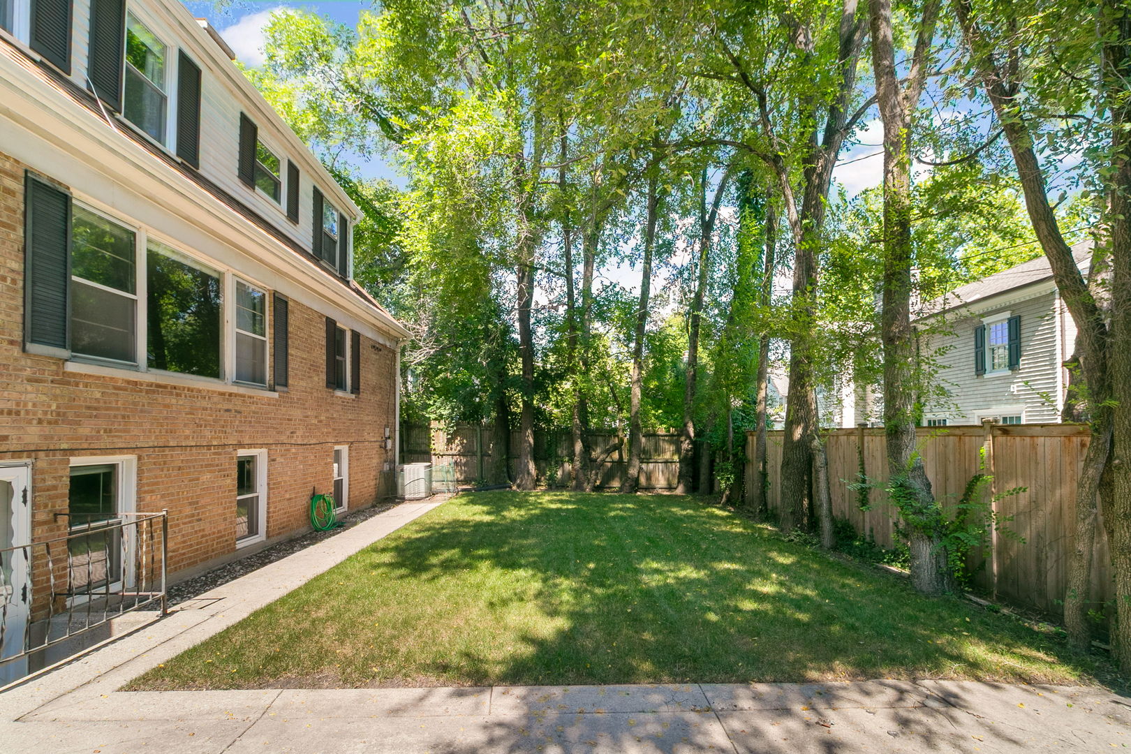 381 Wilson Street Winnetka, IL 60093 - Photo 23 of 28 a view of a house with a yard