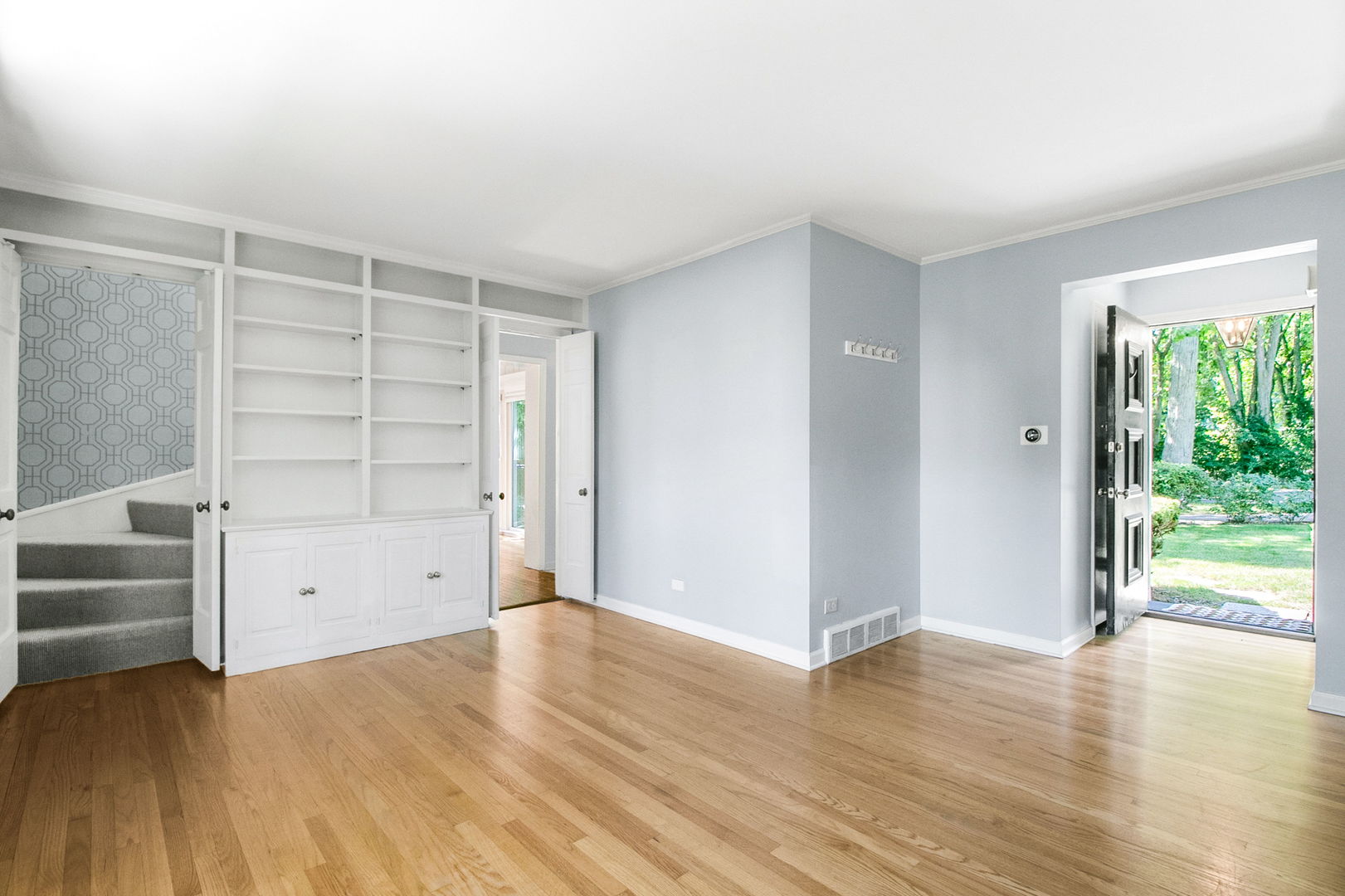 381 Wilson Street Winnetka, IL 60093 - Photo 4 of 28 wooden floor in an empty room with a window