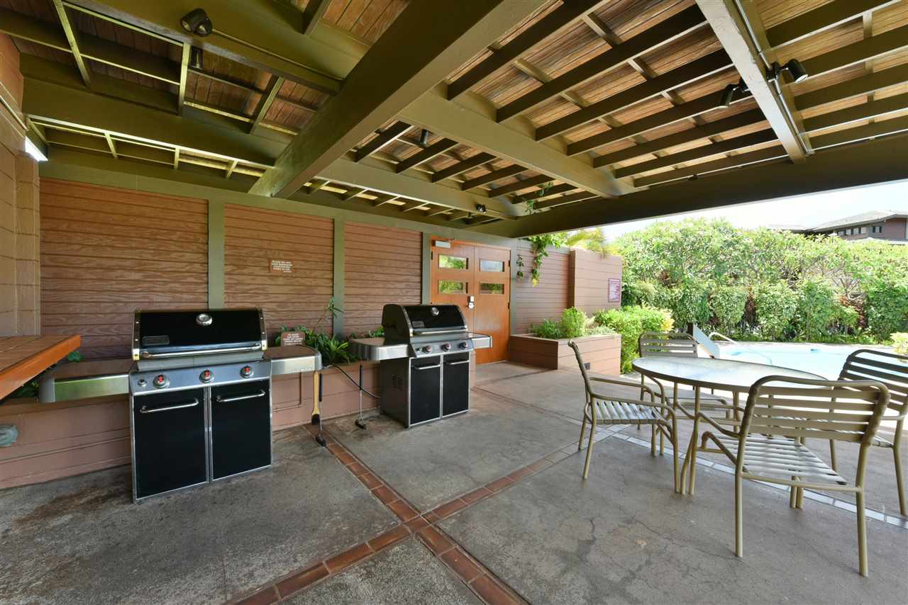 100 Ridge Road, Unit 2312 Lahaina, HI 96761 - Photo 27 of 30 a view of a kitchen with a stove and a chair