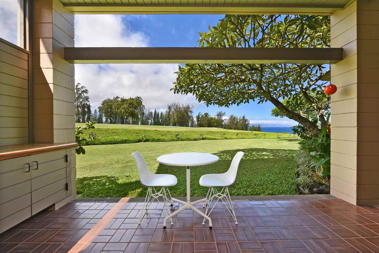 100 Ridge Road, Unit 2312 Lahaina, HI 96761 - Photo 5 of 30 a view of a chair and table in the patio with a yard