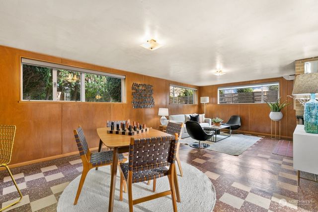 a outdoor space with furniture and lots of tables