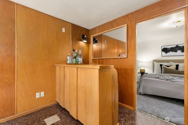 a en suite bathroom with a sink and a mirror