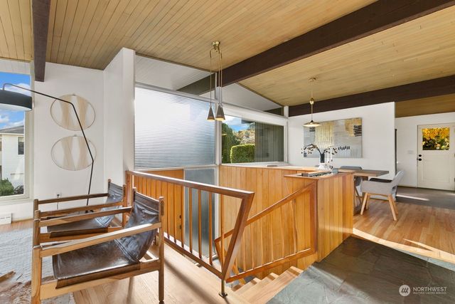 a view of a balcony with furniture