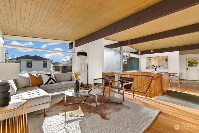 a living room with lots of furniture and rug