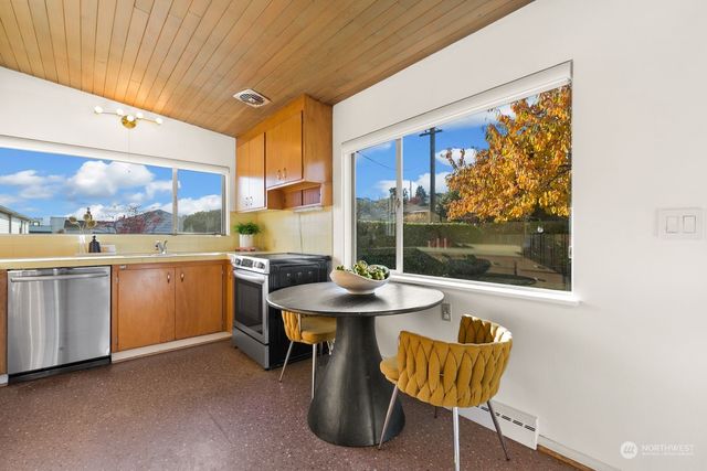 a kitchen with a sink and a stove