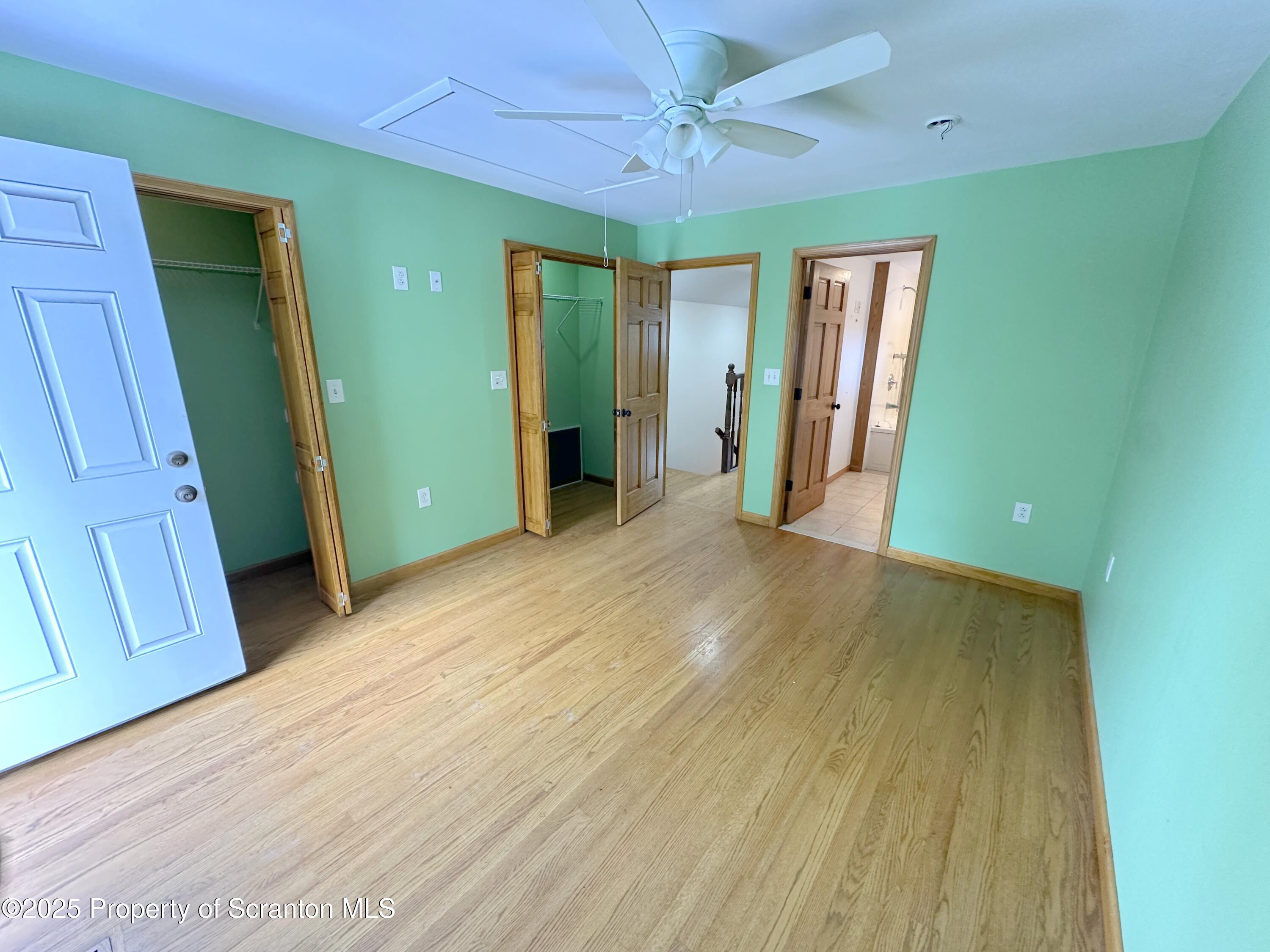 534 2nd Avenue Jessup, PA 18434 - Photo 7 of 14 a view of a room with wooden floor and entryway