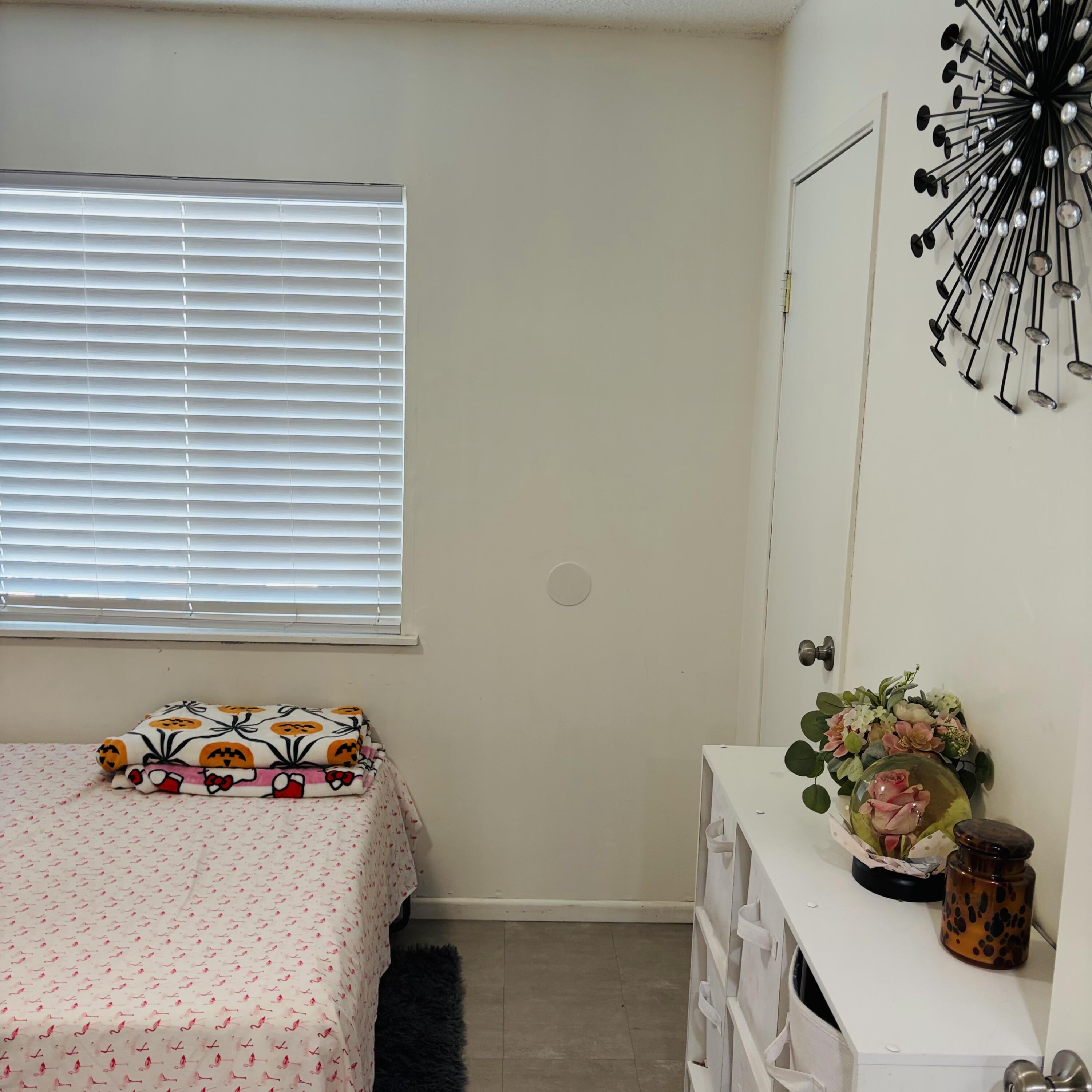 82165 Crest Avenue Indio, CA 92201 - Photo 18 of 37 a room with a cabinet and a table