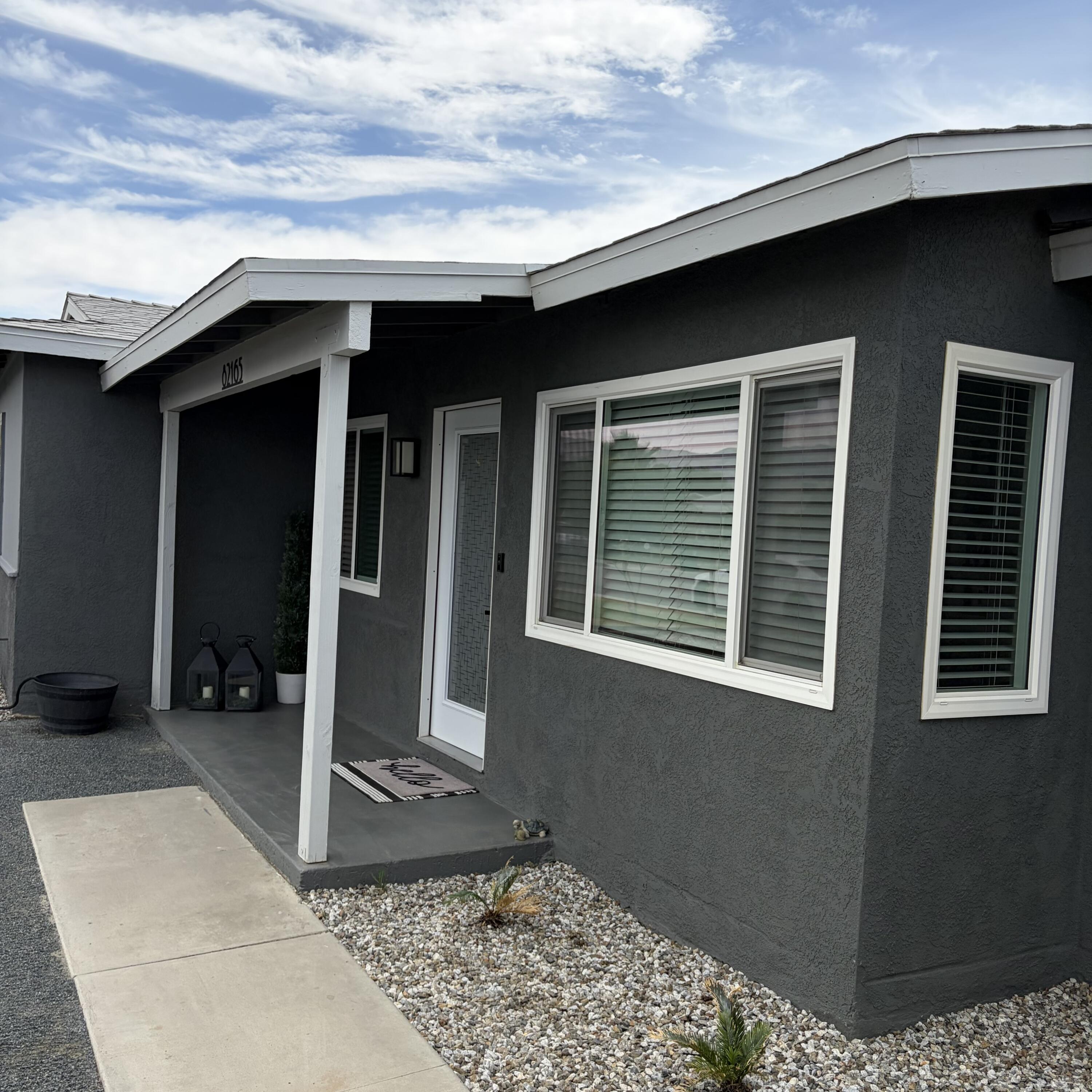 82165 Crest Avenue Indio, CA 92201 - Photo 2 of 37 a backyard of a house