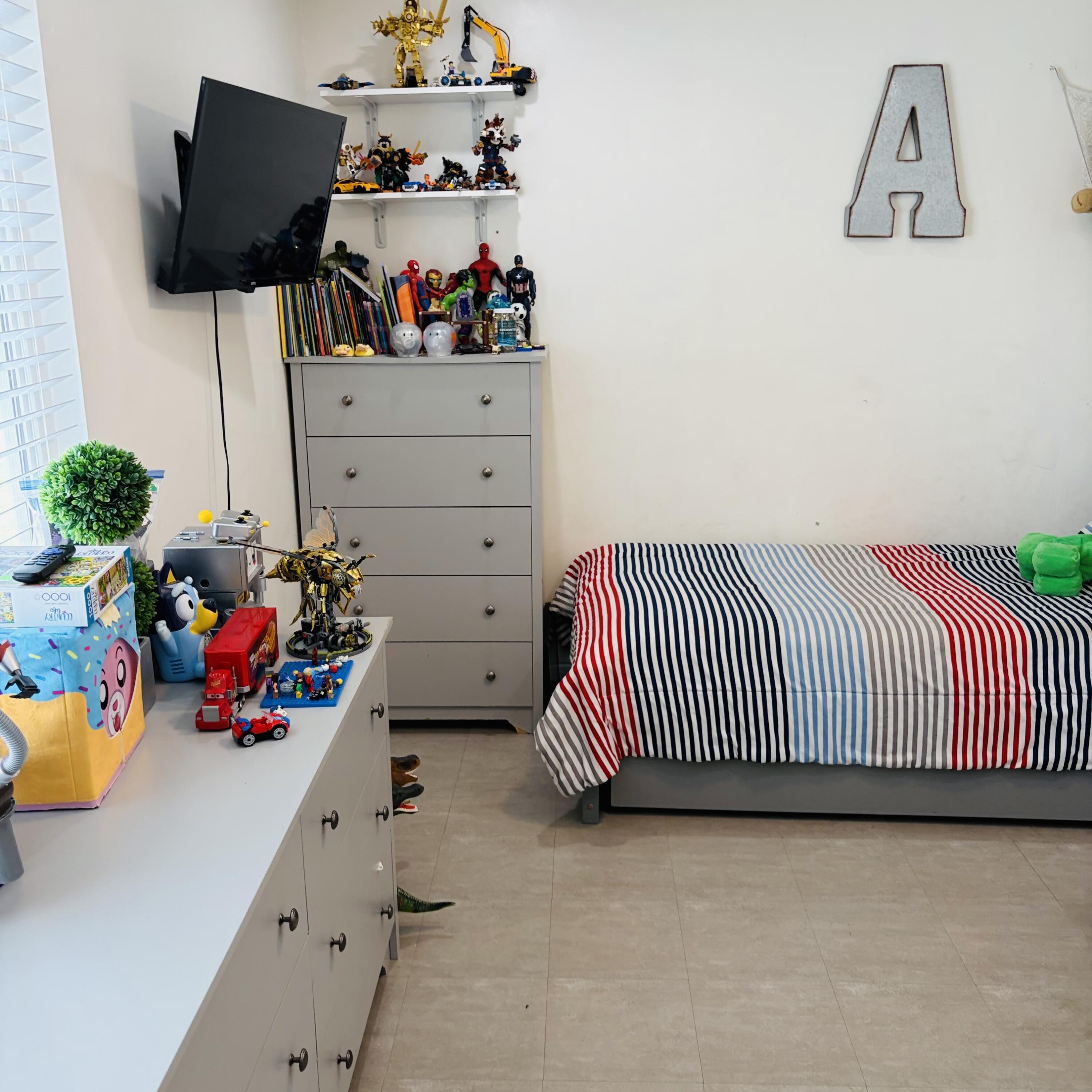 82165 Crest Avenue Indio, CA 92201 - Photo 22 of 37 a bedroom with a bed and a dresser