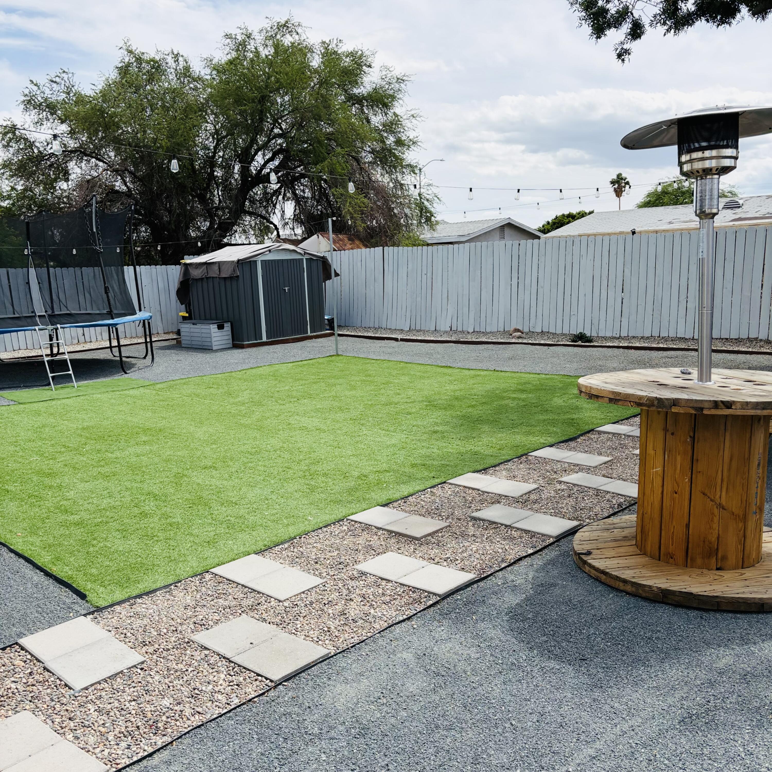 82165 Crest Avenue Indio, CA 92201 - Photo 29 of 37 a view of a backyard with sitting area
