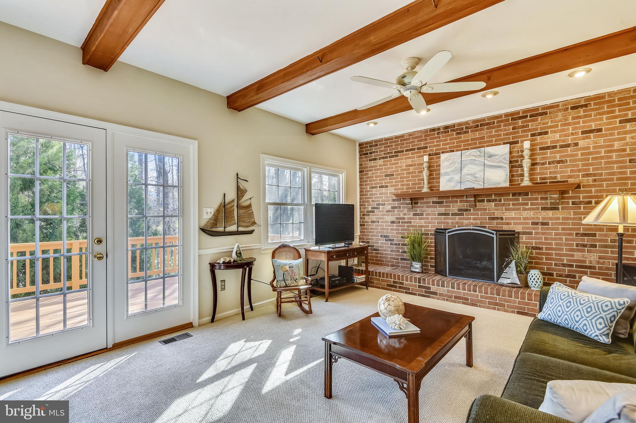 11620 Deer Forest Road Reston, VA 20194 - Photo 11 of 57 Family room with wood-burning fireplace