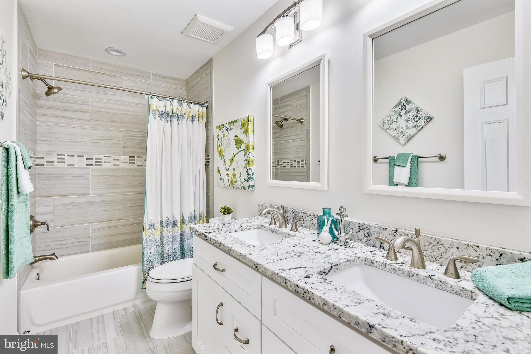 11620 Deer Forest Road Reston, VA 20194 - Photo 29 of 57 Upstairs hall bath - so pretty!