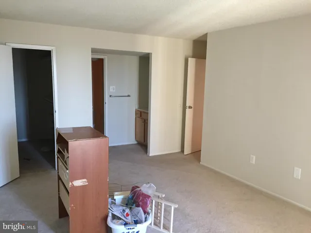 a livingroom with furniture and a window
