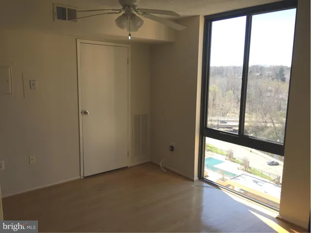 a view of an empty room and window