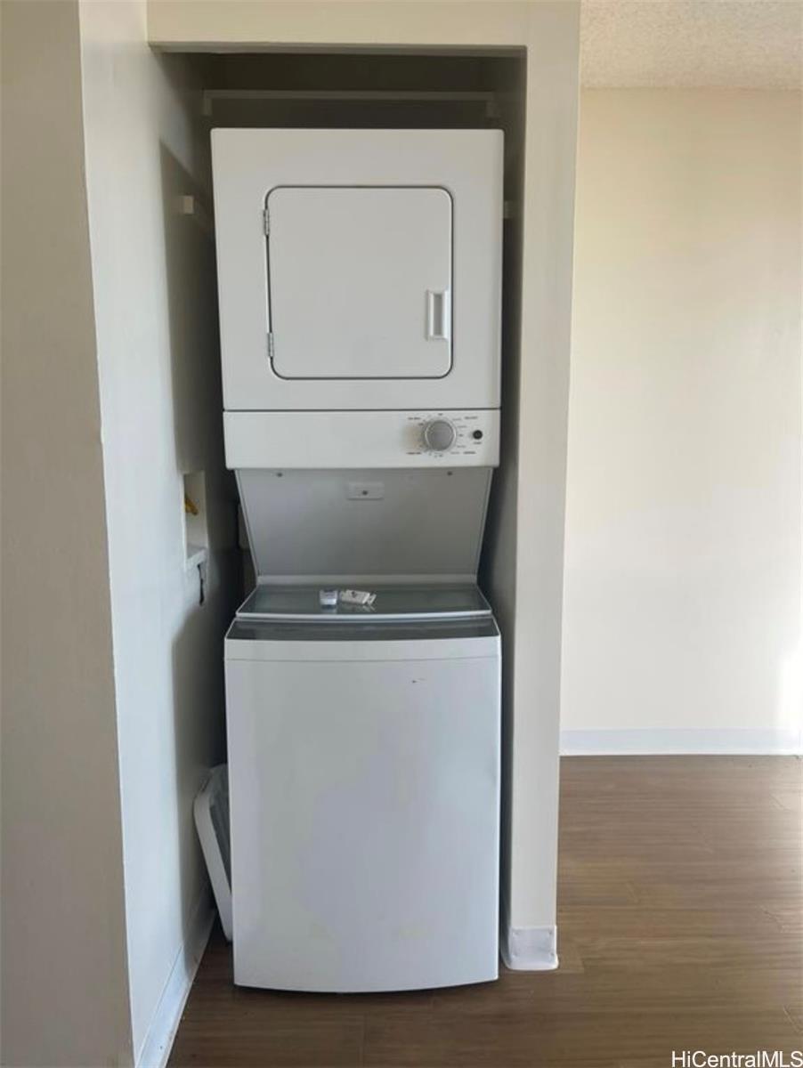 1560 Thurston Avenue, Unit 502 Honolulu, HI 96822 - Photo 8 of 9 a utility room with dryer and washer