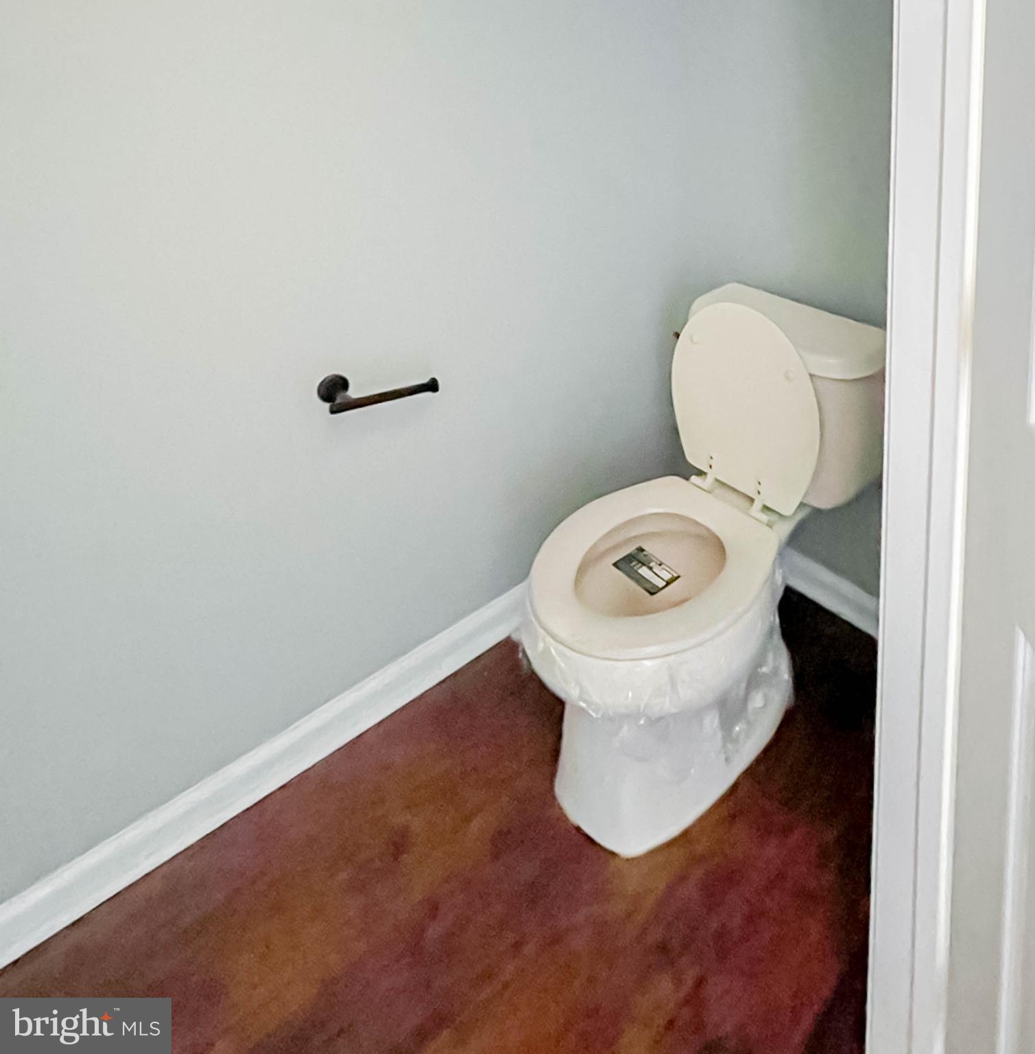 7 Tailor Lane Sicklerville, NJ 08081 - Photo 11 of 28 a bathroom with a toilet and a mirror