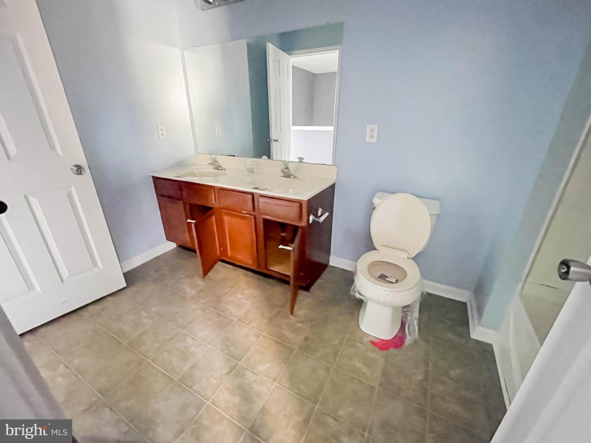 7 Tailor Lane Sicklerville, NJ 08081 - Photo 19 of 28 a bathroom with a sink mirror and toilet