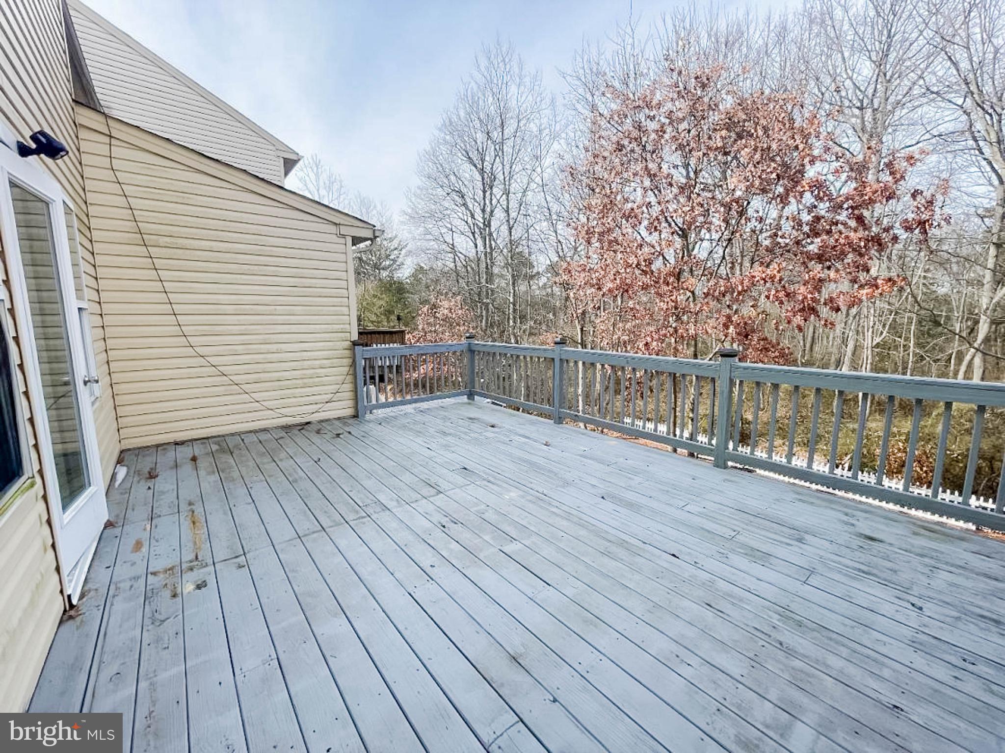 7 Tailor Lane Sicklerville, NJ 08081 - Photo 26 of 28 a view of wooden deck with a bench