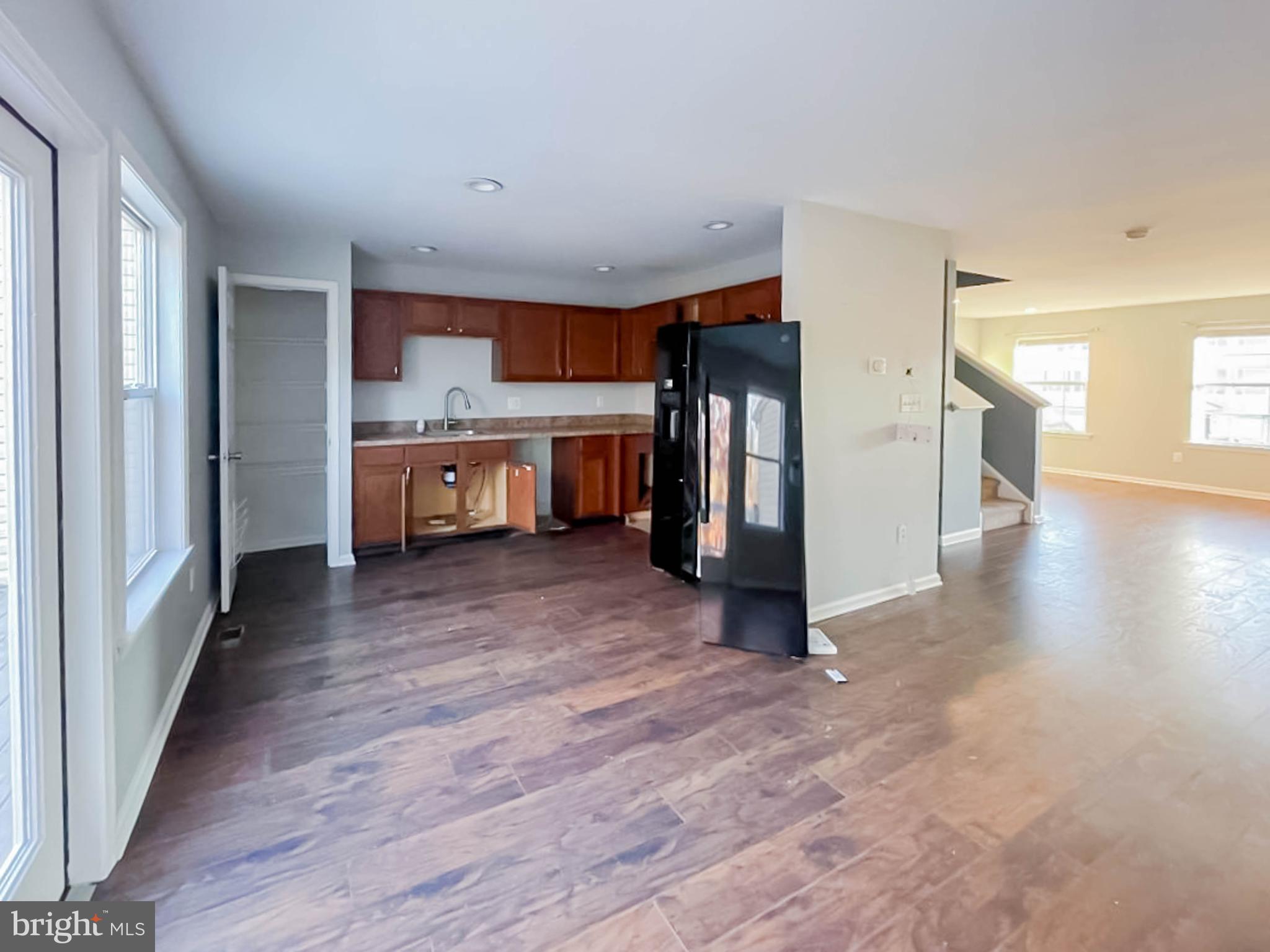 7 Tailor Lane Sicklerville, NJ 08081 - Photo 10 of 28 a view of a kitchen with kitchen island and wooden floor