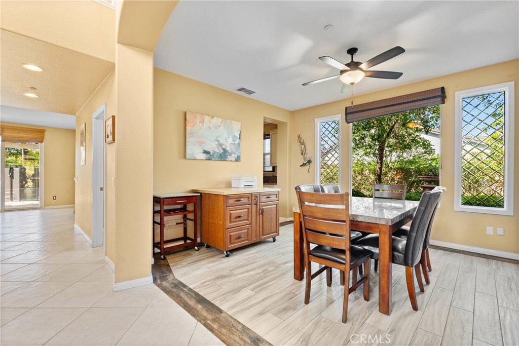1137 Pamplona Drive Riverside, CA 92508 - Photo 13 of 50 a view of a dining room with furniture window and wooden floor