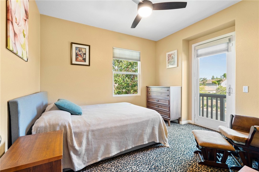 1137 Pamplona Drive Riverside, CA 92508 - Photo 35 of 50 a bedroom with a bed and wooden floor