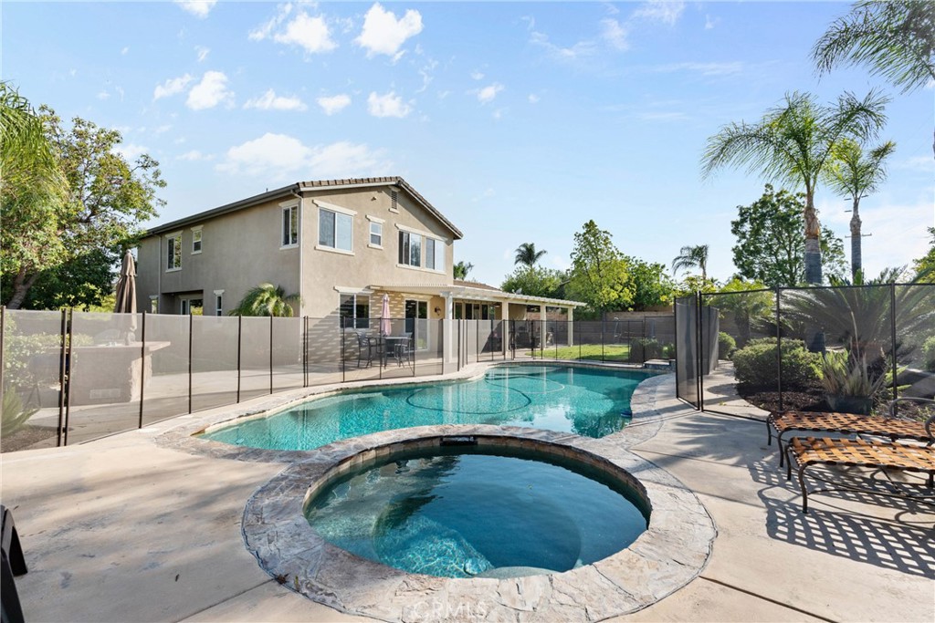 1137 Pamplona Drive Riverside, CA 92508 - Photo 40 of 50 a view of a house with backyard porch and sitting area
