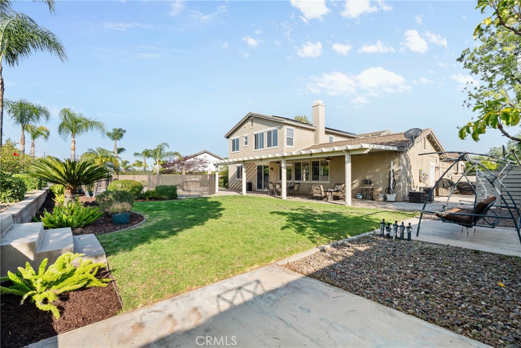 1137 Pamplona Drive Riverside, CA 92508 - Photo 43 of 50 a front view of a house with garden