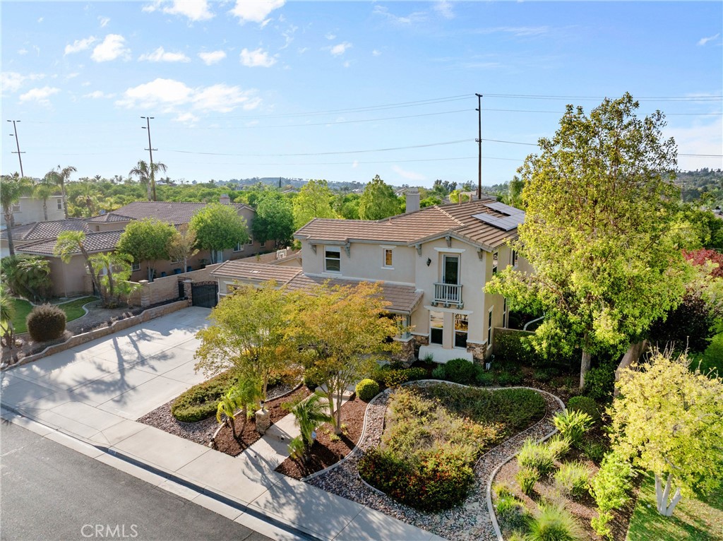 1137 Pamplona Drive Riverside, CA 92508 - Photo 44 of 50 a view of a house with a yard and sitting area