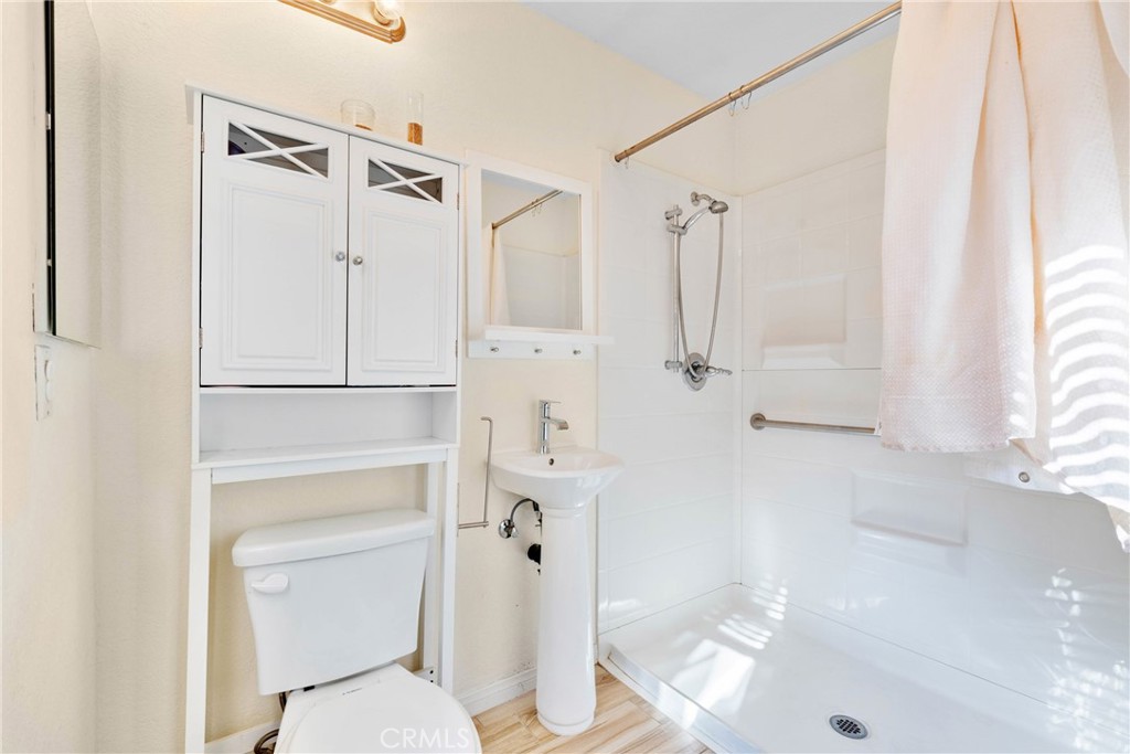 1137 Pamplona Drive Riverside, CA 92508 - Photo 9 of 50 a bathroom with a shower and a toilet