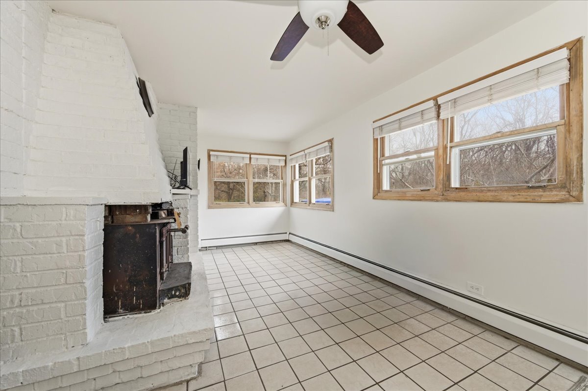6N879 Dunham Road Wayne, IL 60184 - Photo 12 of 27 a view of an empty room with a window