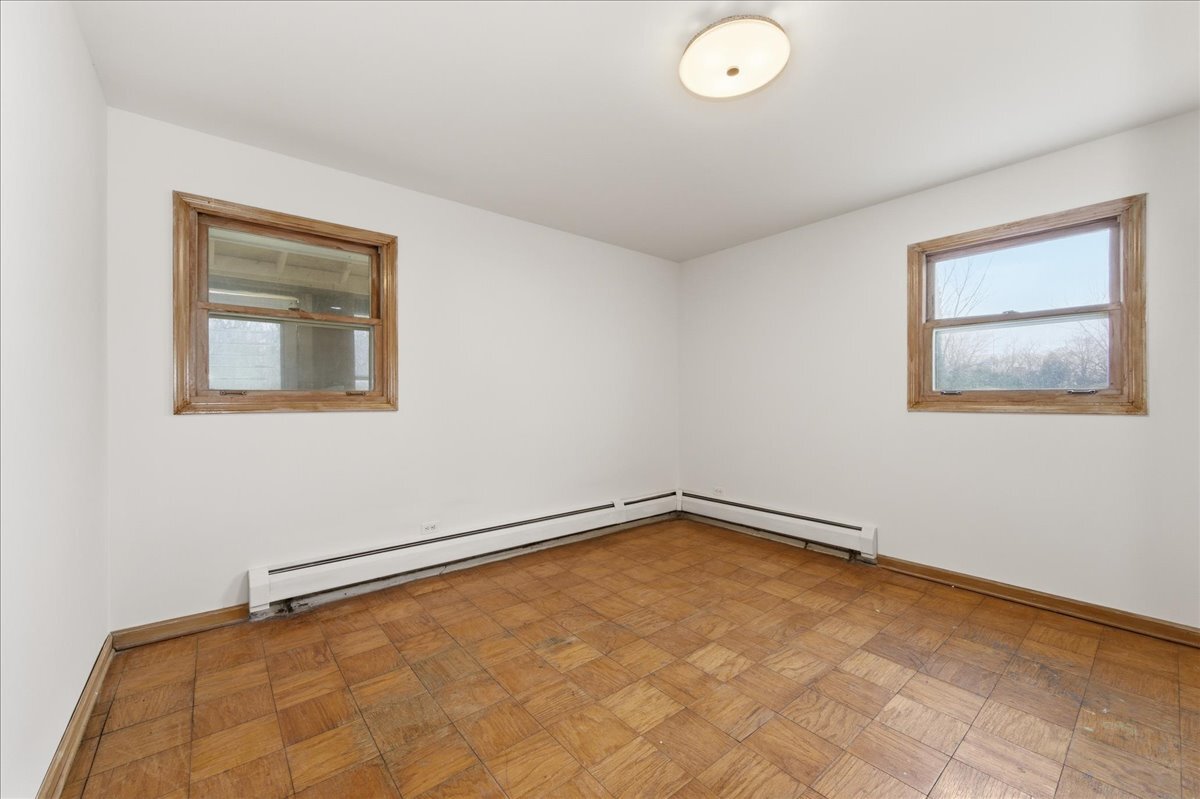 6N879 Dunham Road Wayne, IL 60184 - Photo 17 of 27 an empty room with a window