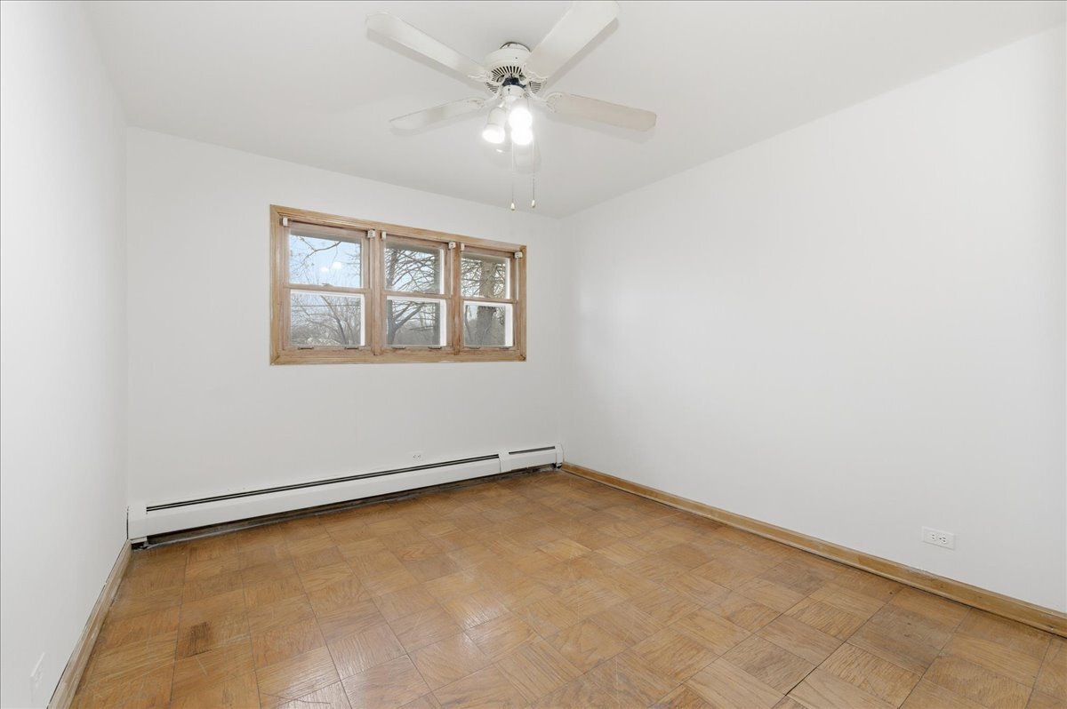 6N879 Dunham Road Wayne, IL 60184 - Photo 18 of 27 an empty room with a window and a fan