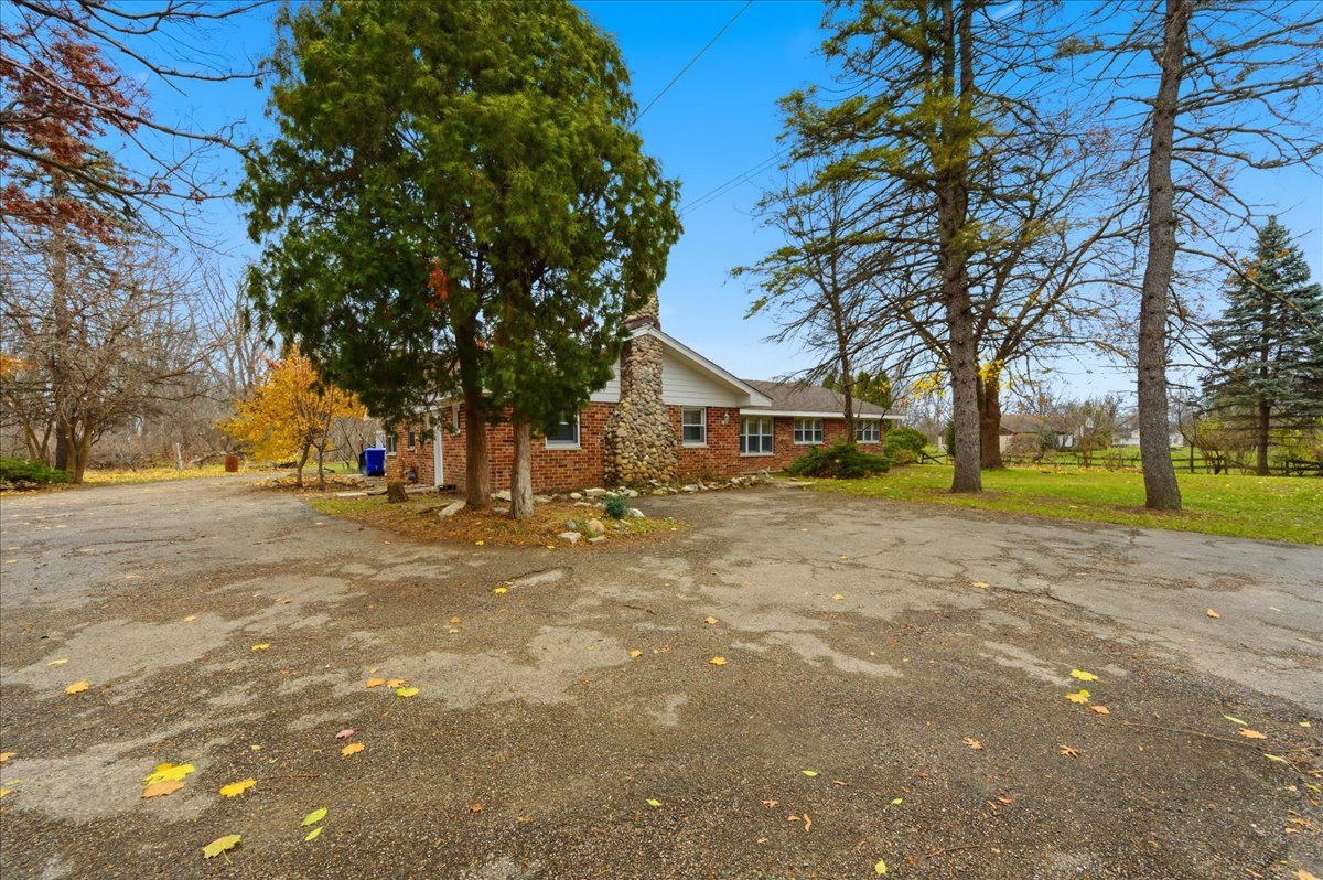 6N879 Dunham Road Wayne, IL 60184 - Photo 2 of 27 a view of road with trees