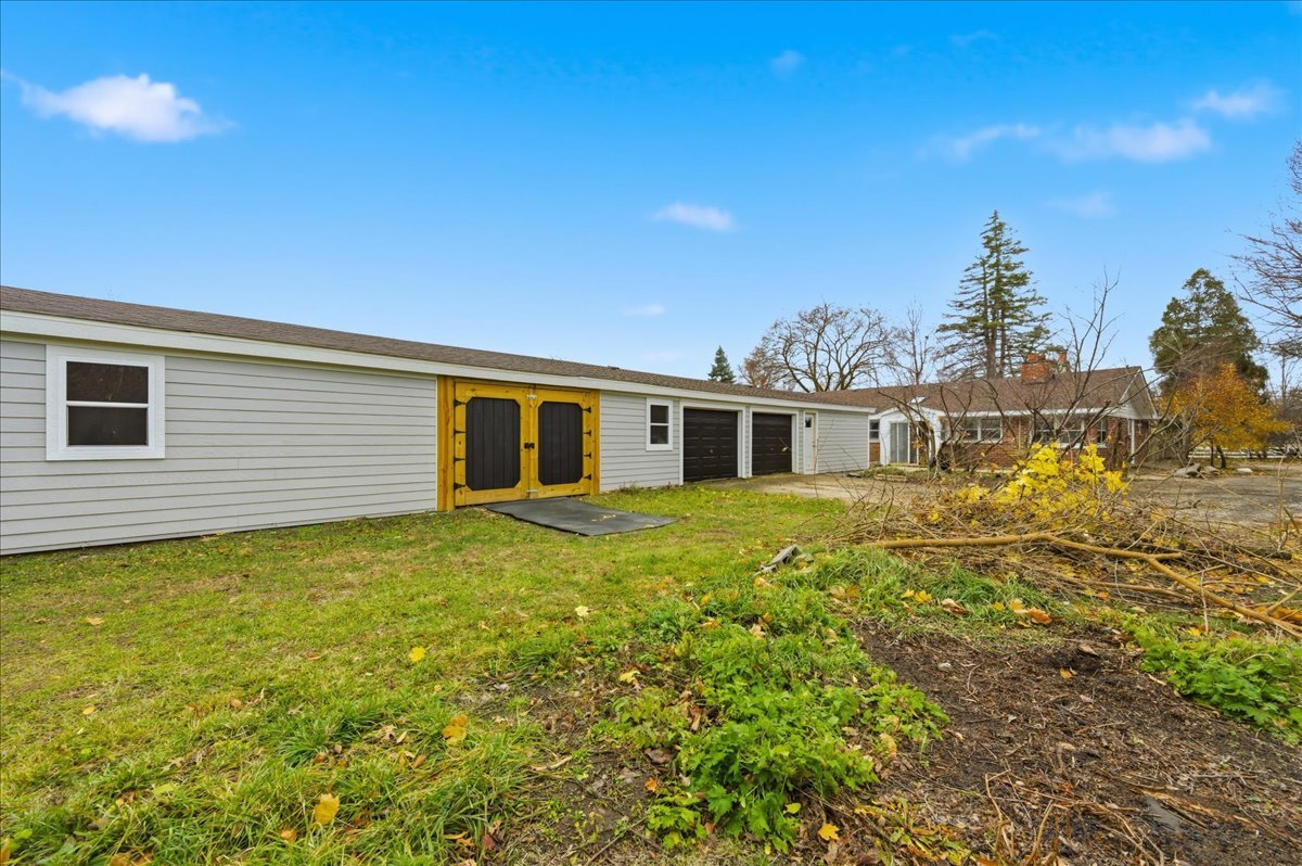 6N879 Dunham Road Wayne, IL 60184 - Photo 23 of 27 a front view of a house with a yard