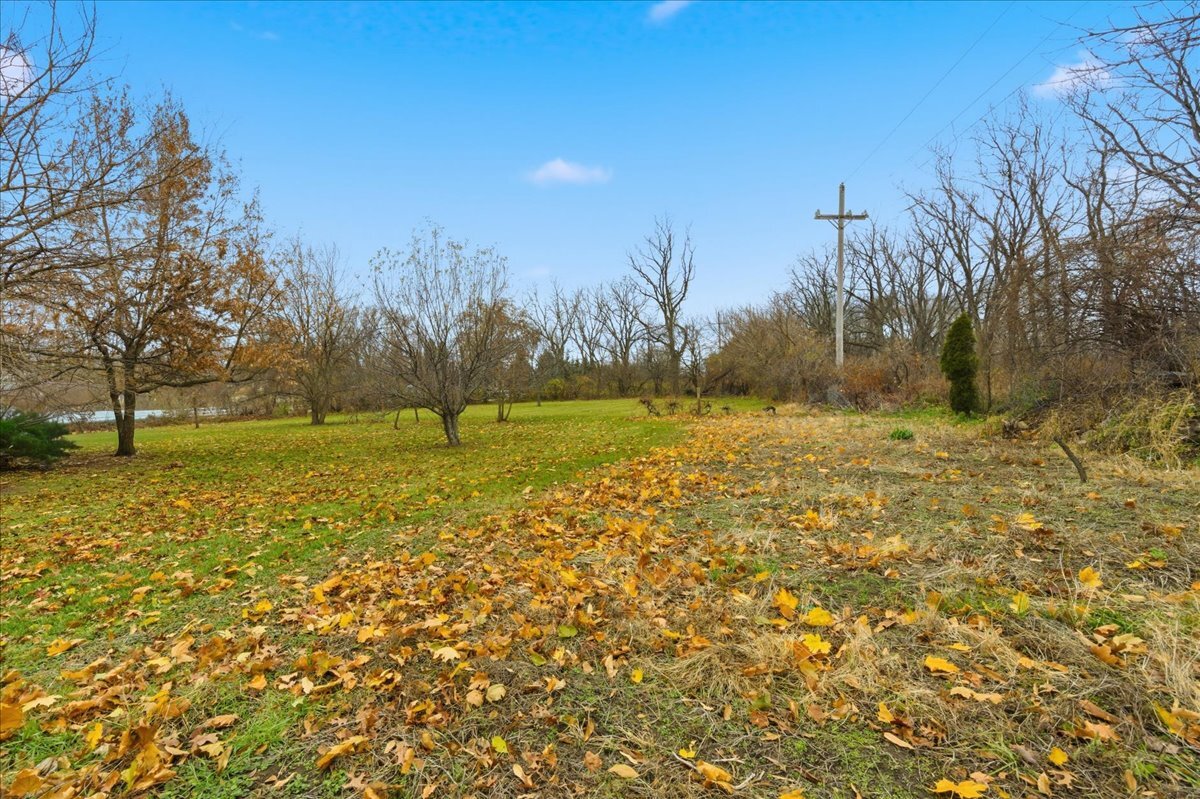 6N879 Dunham Road Wayne, IL 60184 - Photo 26 of 27 a view of outdoor space with trees all around