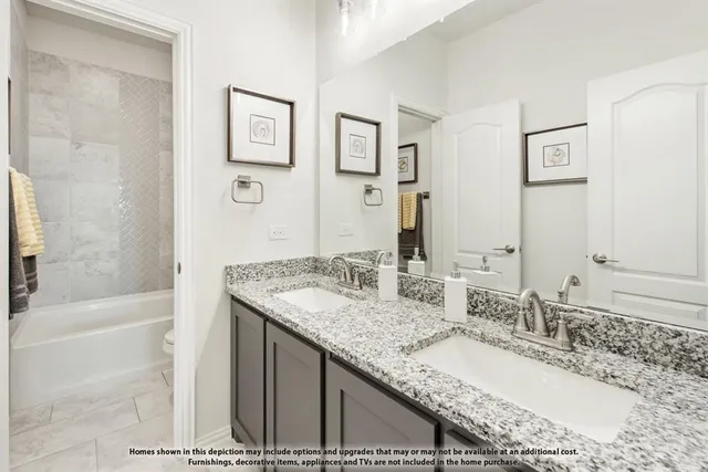 a bedroom with a bed and a large window with outer view