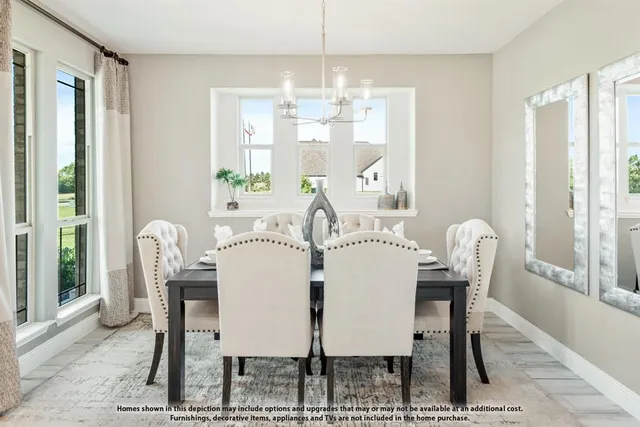 a living room with furniture a window and dining table