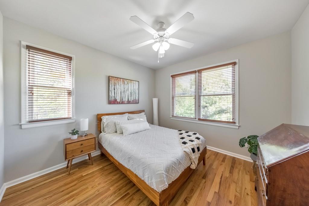 304 Turning Leaf Court Canton, GA 30115 - Photo 30 of 73 a bedroom with a bed and window
