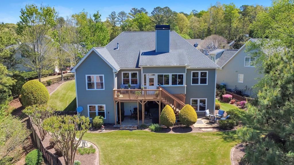 304 Turning Leaf Court Canton, GA 30115 - Photo 66 of 73 a aerial view of a house with swimming pool garden and patio