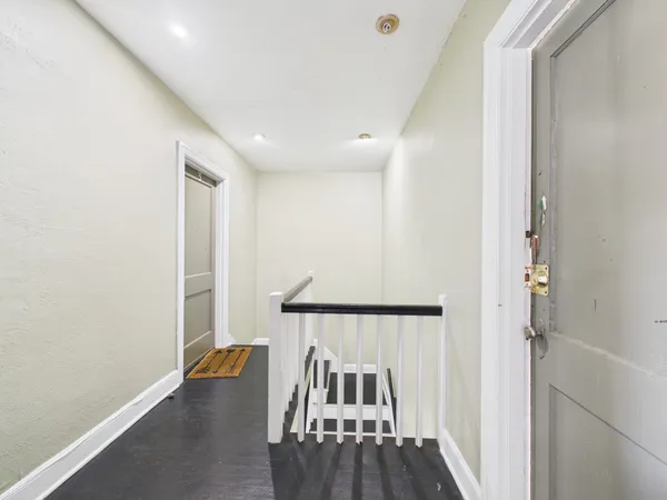 a kitchen with stainless steel appliances granite countertop a refrigerator and a stove