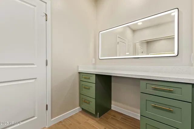 a room with a cabinets and a dresser