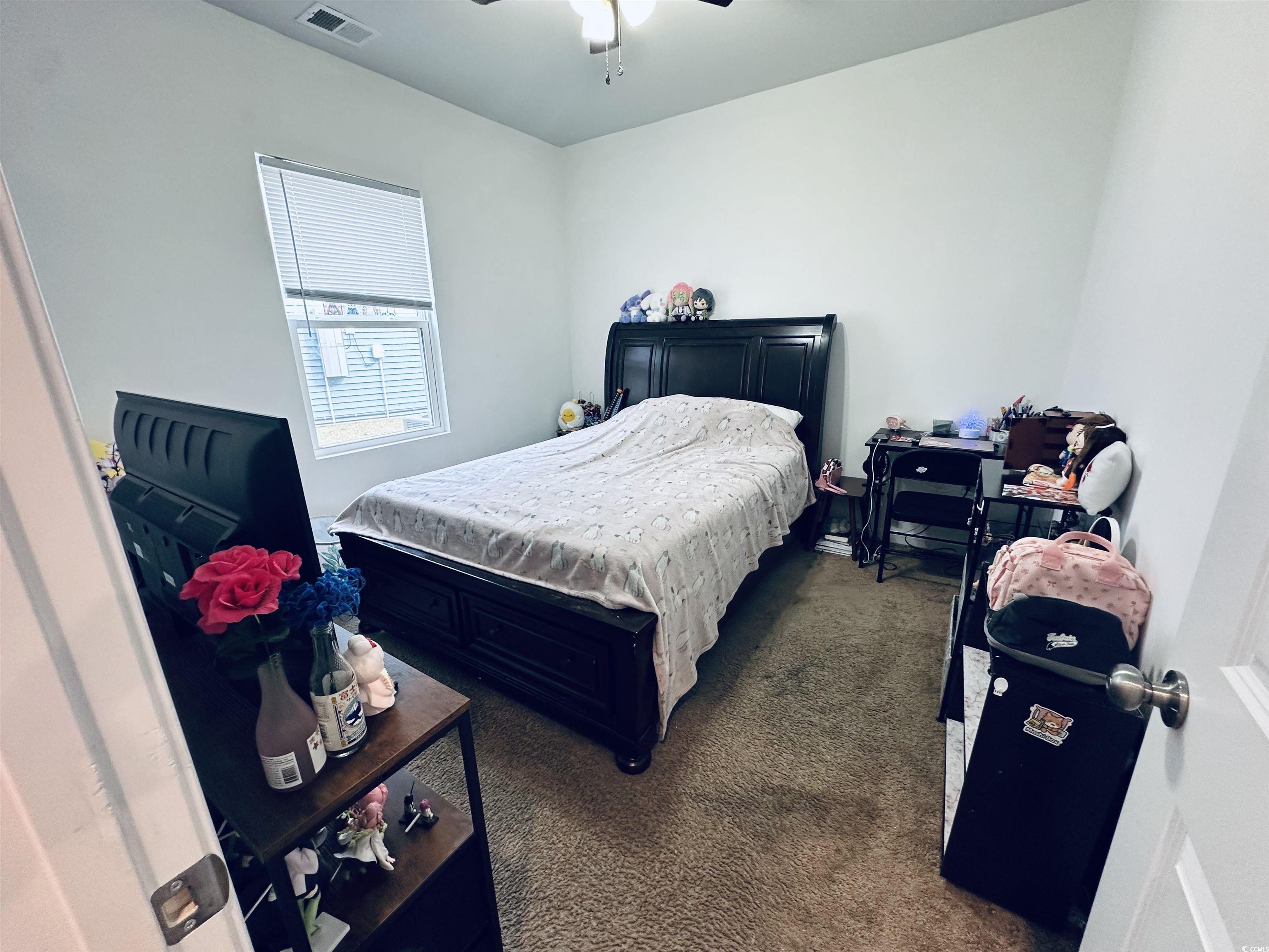 5260 Walnutwood Trail Myrtle Beach, SC 29579 - Photo 19 of 30 Bedroom with carpet flooring and ceiling fan