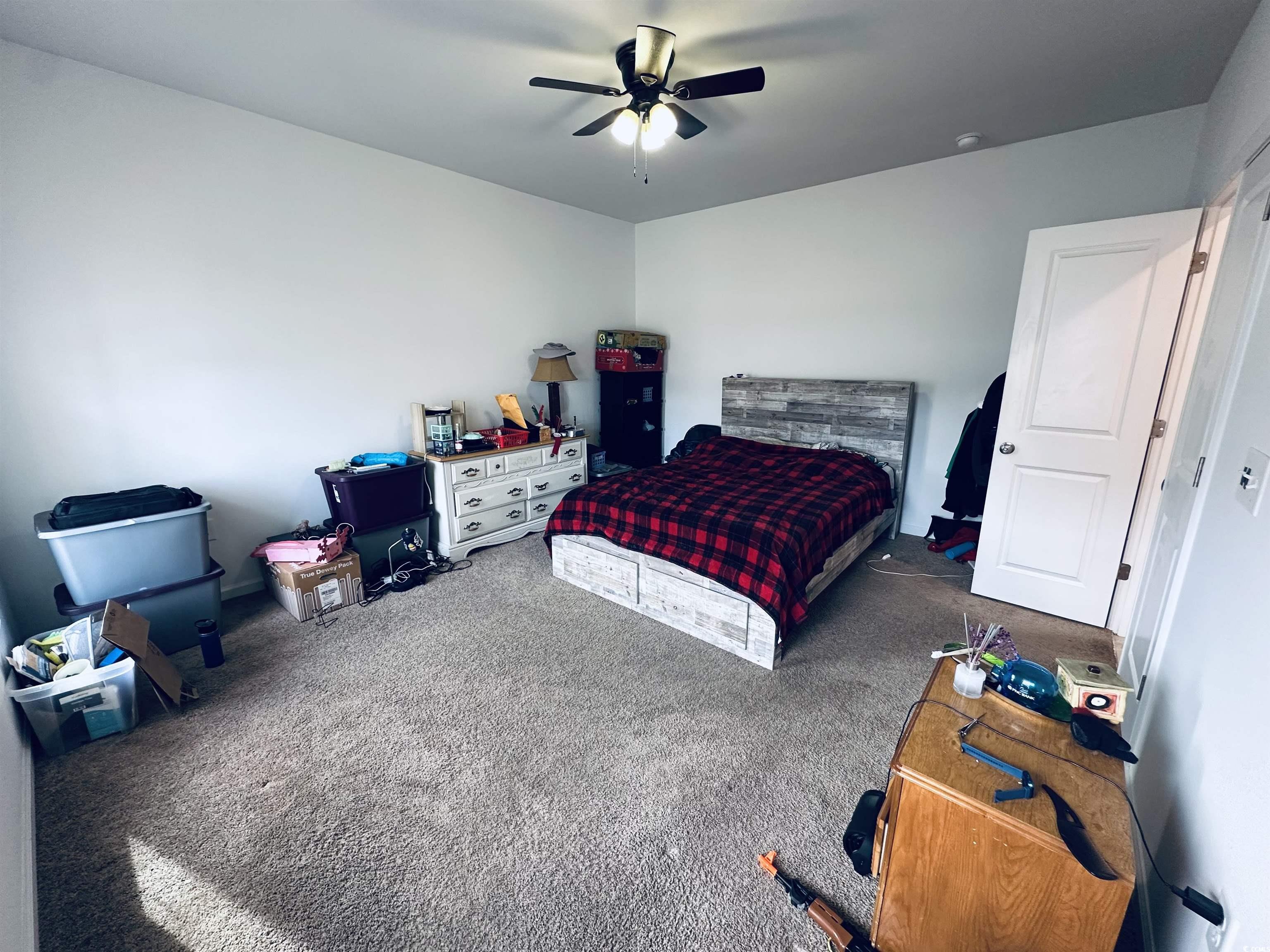 5260 Walnutwood Trail Myrtle Beach, SC 29579 - Photo 6 of 30 Carpeted bedroom with ceiling fan
