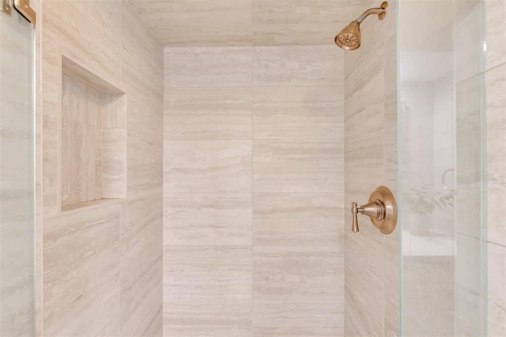 10763 Villager Road, Unit A Dallas, TX 75230 - Photo 12 of 21 a bathroom with a shower